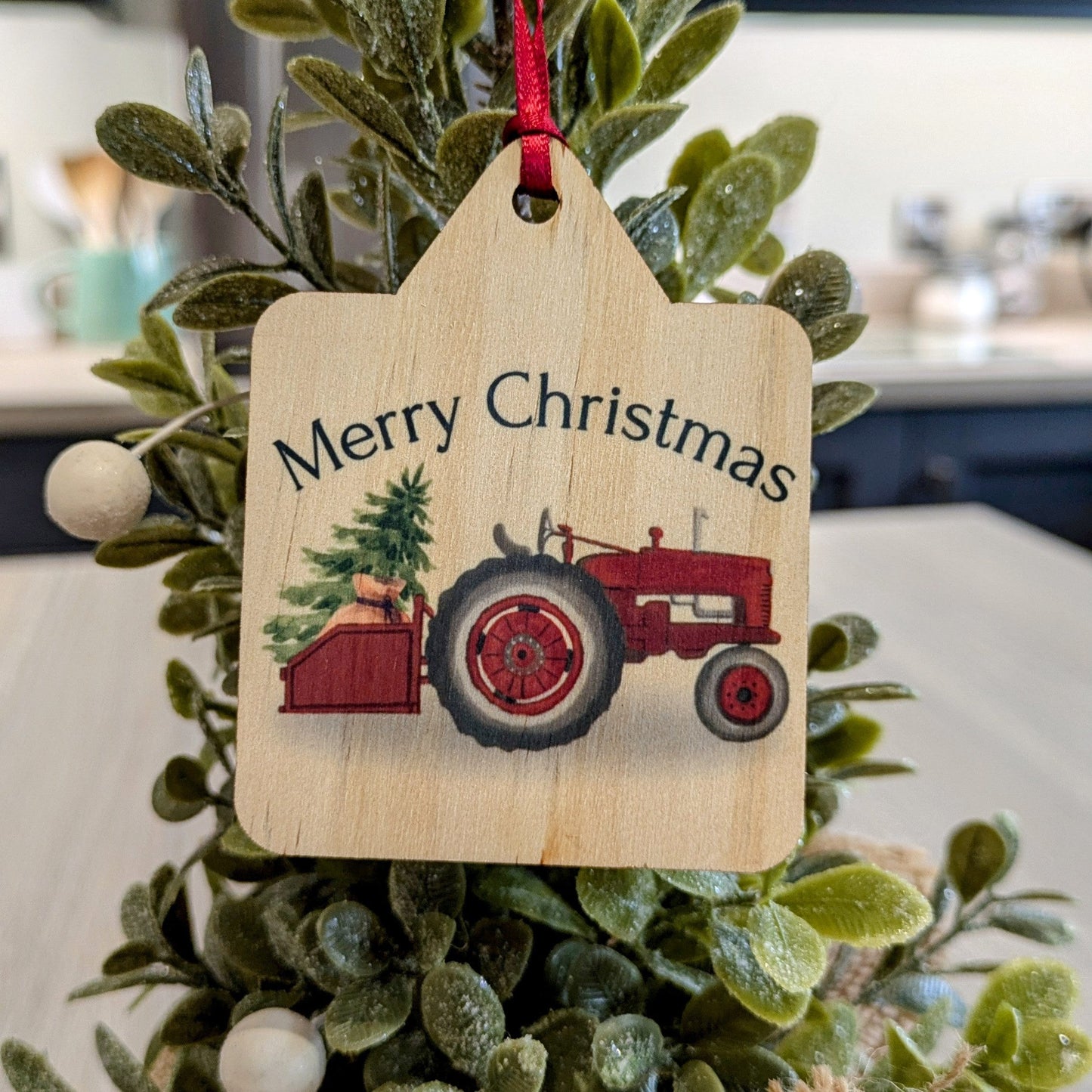 Christmas tree decoration withSanta's red vintage tractor an ear tag shape and complete with a red ribbon - farmer – farming – gift – farmhouse – country kitchen – country style – country Christmas decor country living style – farmers wife – Christmas gift ideas