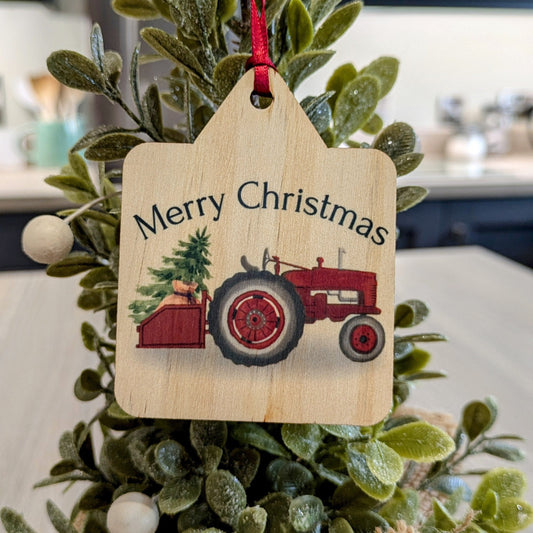 Christmas tree decoration withSanta's red vintage tractor an ear tag shape and complete with a red ribbon - farmer – farming – gift – farmhouse – country kitchen – country style – country Christmas decor country living style – farmers wife – Christmas gift ideas 